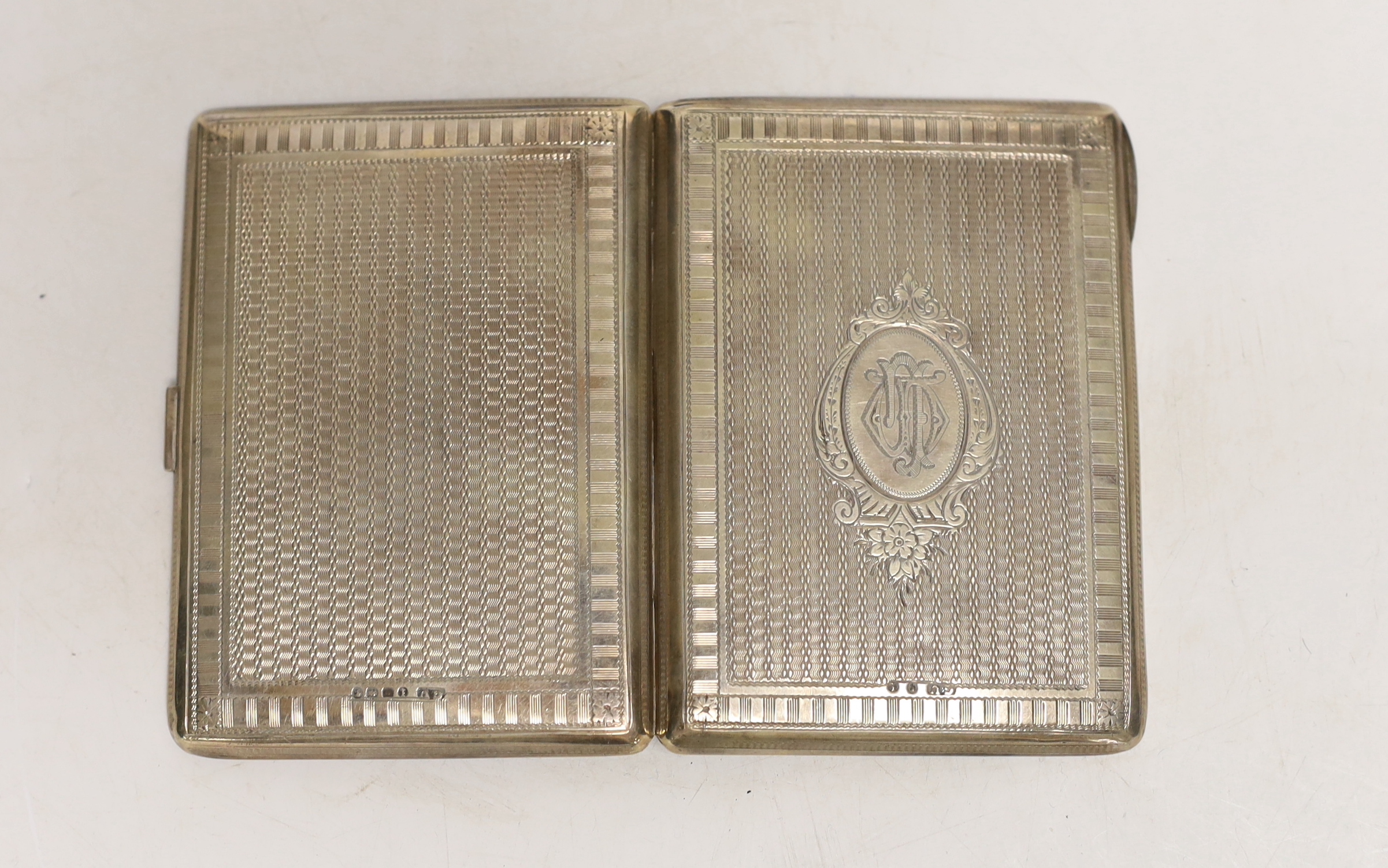 A late Victorian silver rectangular card/aide memoir purse, George Unite, Birmingham, 1885, 10cm, in fitted case.